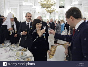 russian-president-dmitry-medvedev-r-toasts-french-singer-mireille-FMHJRX