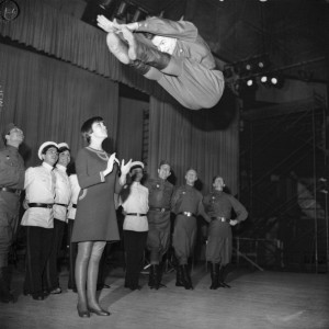 FRANCE - NOVEMBER 22:  On November 22Nd, 1967, The Singer Admiring The Acrobatics Of One Of The Members Of The Chorus Who Would Perform With Her A Few Songs At The Palais Des Sports Of Paris.  (Photo by Keystone-France/Gamma-Keystone via Getty Images)