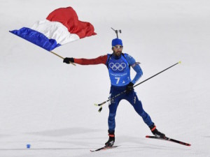 Biathlon - Pyeongchang 2018 Winter Olympics - Mixed Relay Final - Alpensia Biathlon Centre - Pyeongchang, South Korea - February 20, 2018 - Martin Fourcade of France finishes. REUTERS/Toby Melville